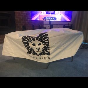 Anne Klein logo round table cover by Viaggio